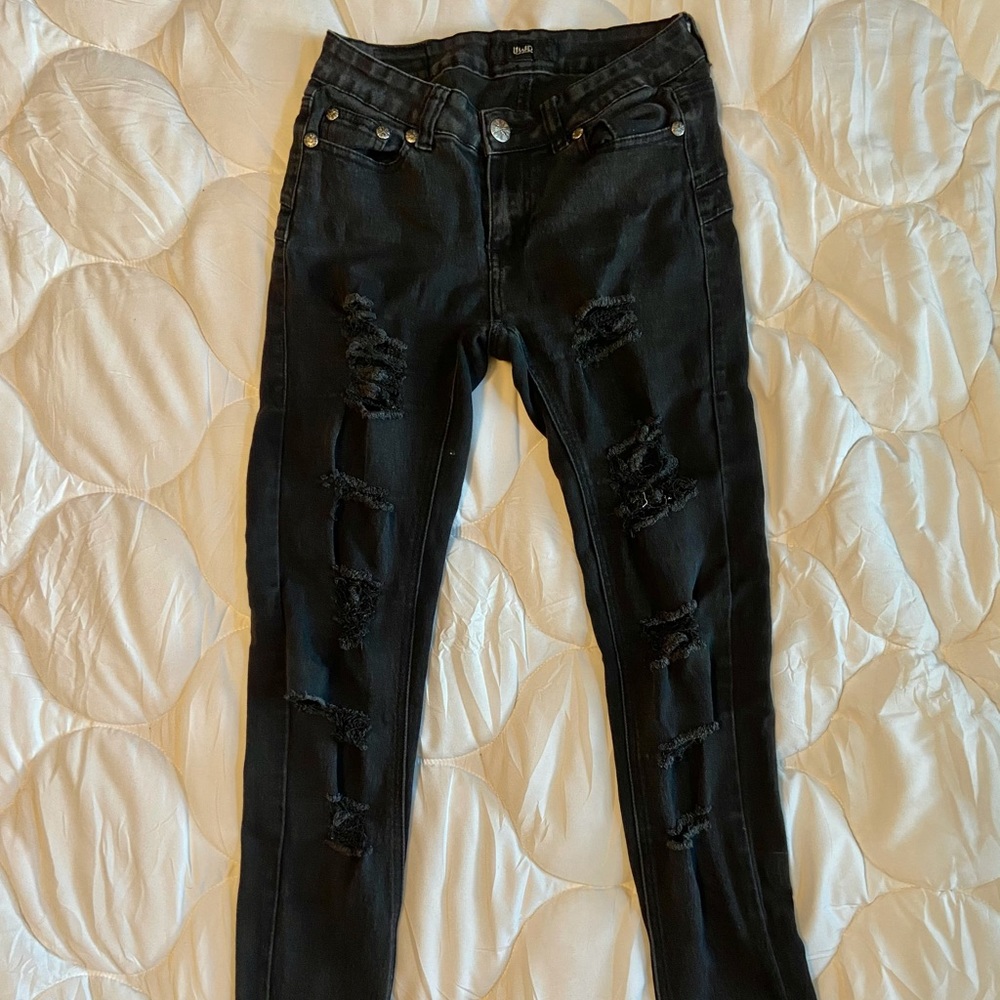 Stretchy ripped skinny black jeans